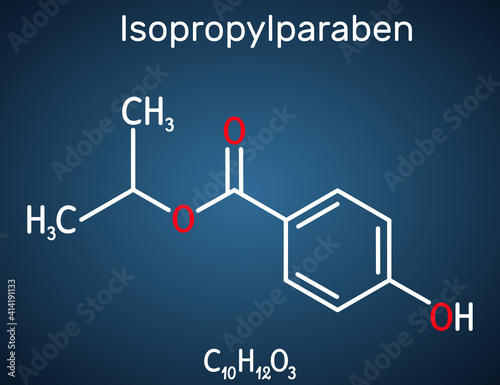 Isopropylparaben, isopropyl paraben molecule. It is paraben, antimicrobial, antifungal preservative. Structural chemical formula on the dark blue background