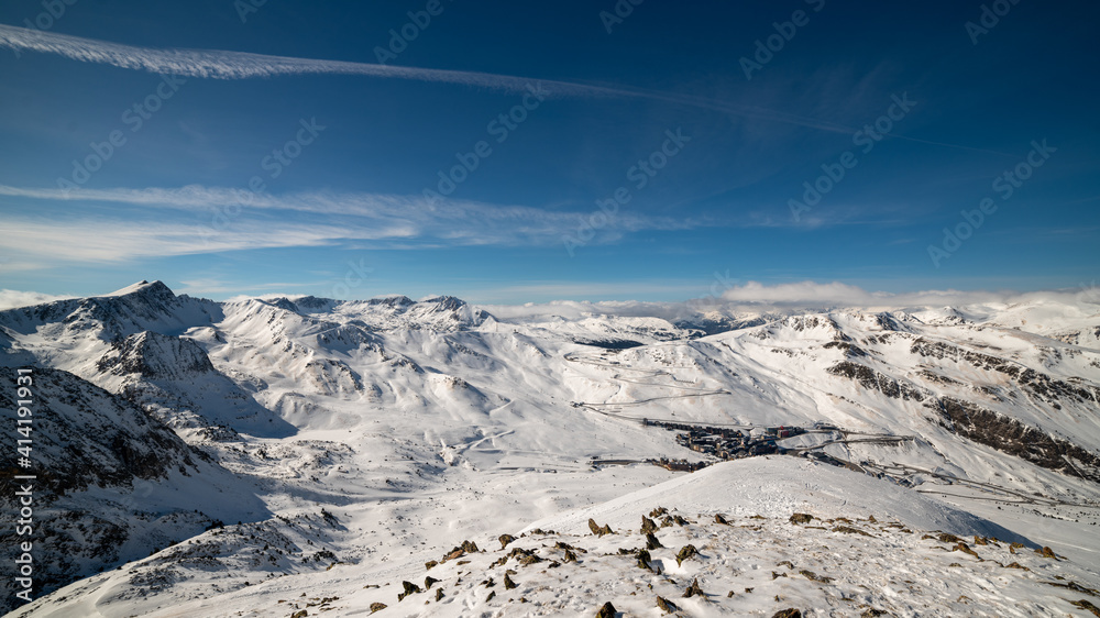 snowy Pyrenees mountains in winter, on the border between Andorra and France.