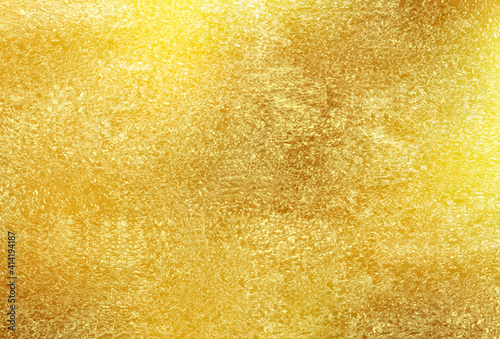 Shiny gold texture foil, paper or metal.