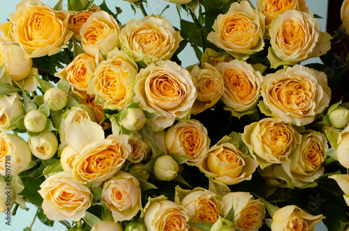 Bouquet of yellow roses, floral background