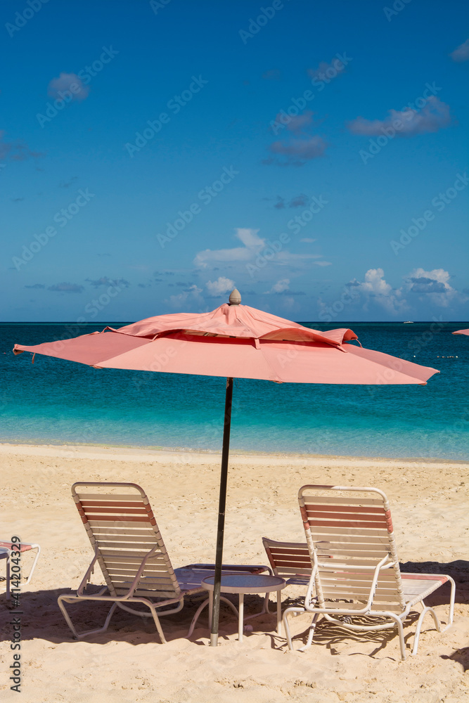 Beach umbrellas on Grace Bay Beach, Providenciales, Turks and Caicos Islands, Caribbean.