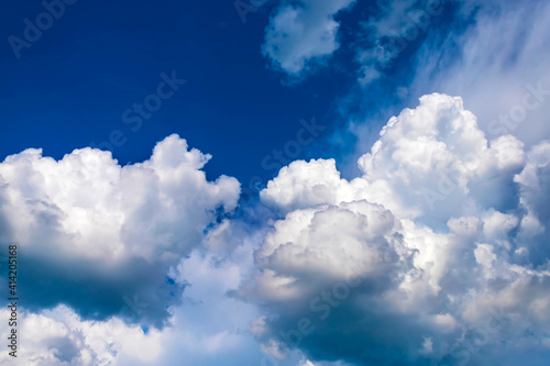 Fototapeta Naklejka Na Ścianę i Meble -  Blue sky with white clouds in sunny summer day.