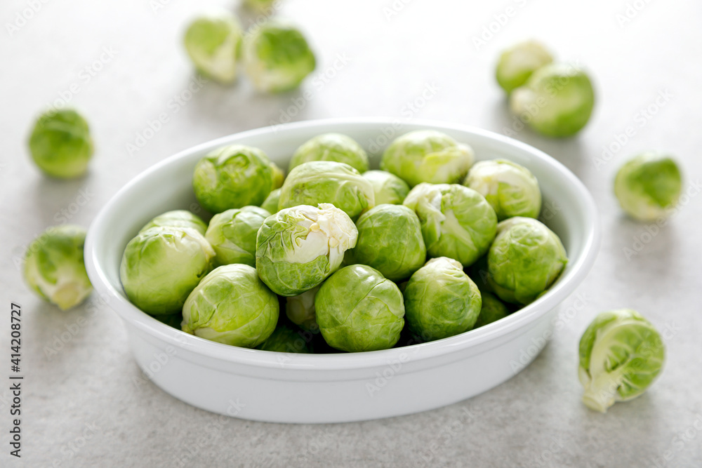 Fresh green brussels sprouts on cooking kitchen table Fresh green brussels sprouts on cooking kitchen table
