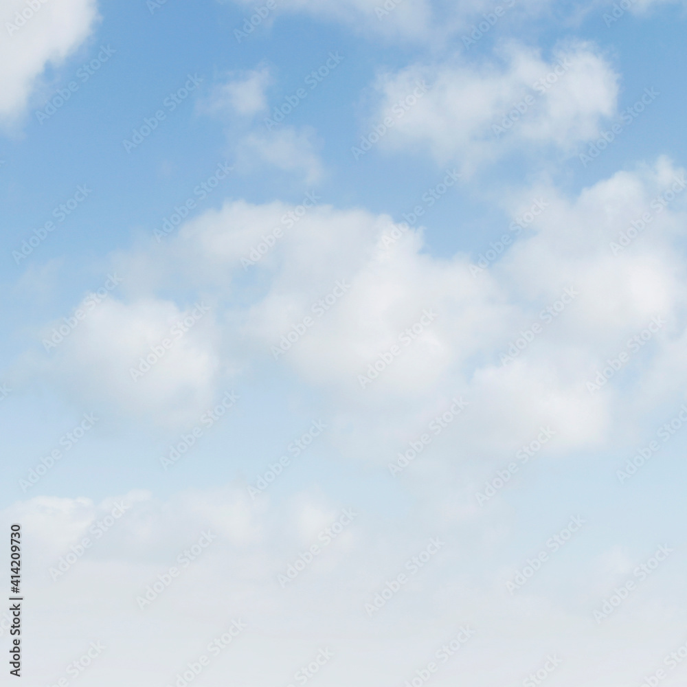 Soft white clouds in blue sky background