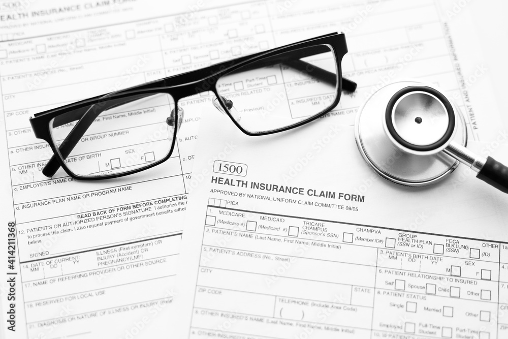 Health Insurance Claim Form. Individual medical health insurance policy with stethoscope and spectacles Health Insurance Claim Form. Individual medical health insurance policy with stethoscope and spectacles