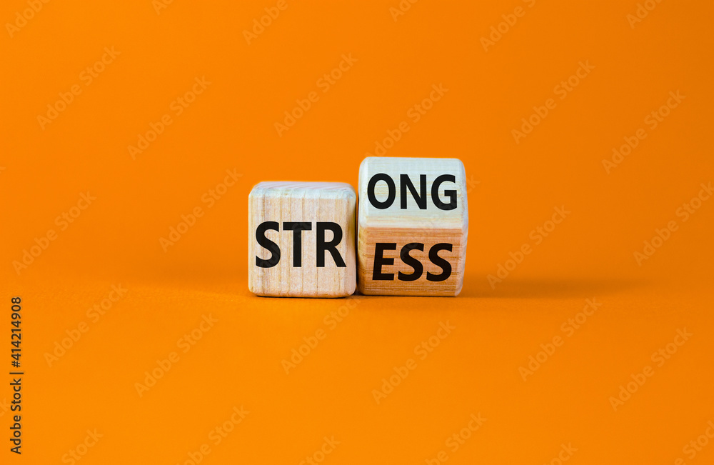 Strong stress symbol. Turned wooden cubes with words 'strong stress ...