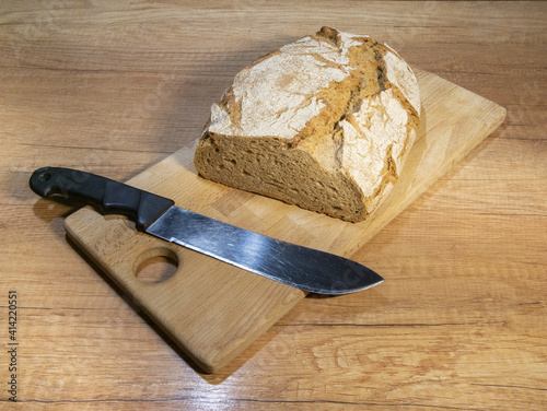 Freshly baked aromatic bread. Bread in a cut. Fragrant pastries close-up. Homemade sourdough bread. Handmade. Food trends. Various types of fresh bread as a background.
