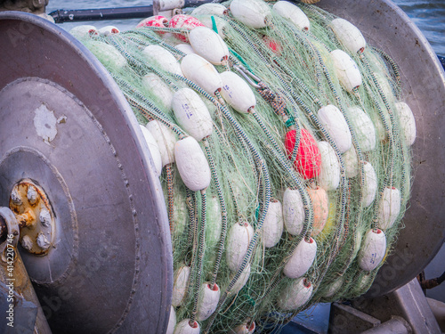 Gill net for sockeye salmon on a drum waiting to be deployed in Bristol Bay Alaska photo