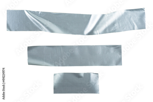 Set pieces of silver self-adhesive construction tape isolated on a white background. Metallic reinforced tape.
