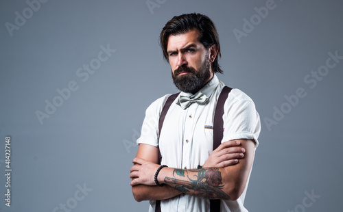 handsome guy hipster with moustache and beard, male fashion