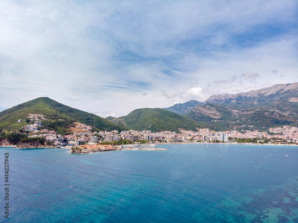 Sunny aerial panoramic view of Budva and Riviera, Montenegro. Drone aerial shot