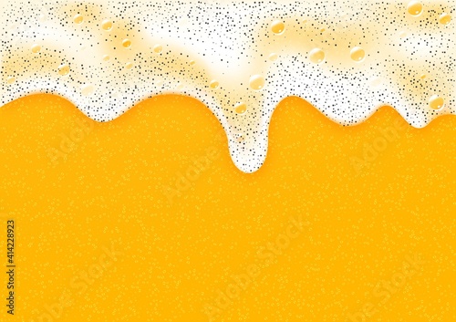 Drops with foam on glass, yellow drink background