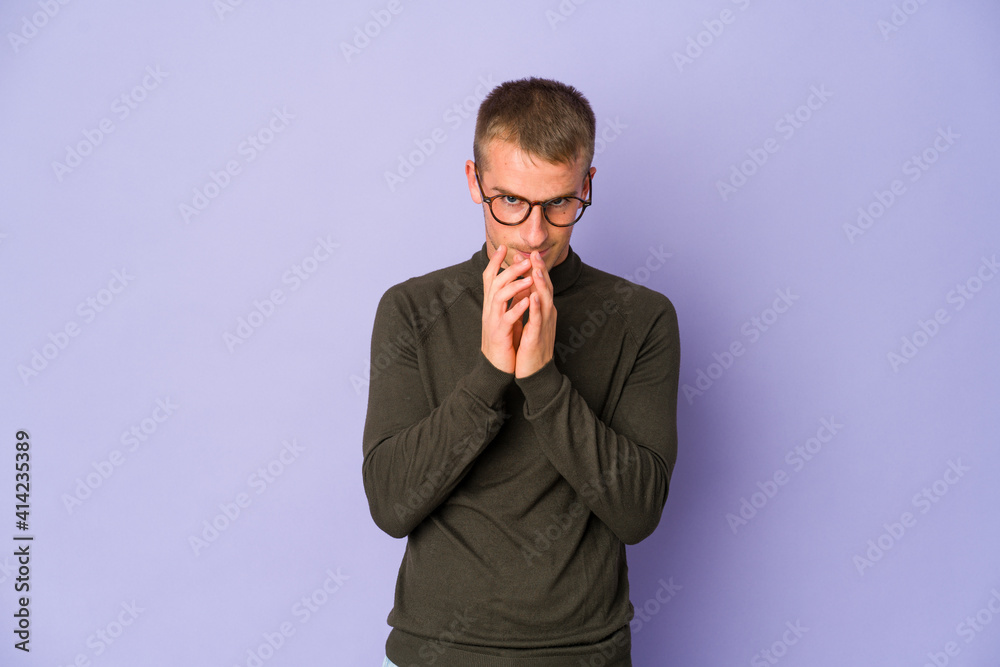 Young caucasian handsome man making up plan in mind, setting up an idea. Young caucasian handsome man making up plan in mind, setting up an idea.