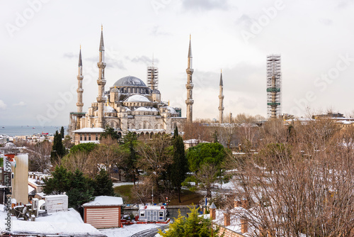 Snowy day in Sultanahmet Square. ISTANBUL, TURKEY. Snowy landscape with Blue Mosque (Sultanahmet Camii).