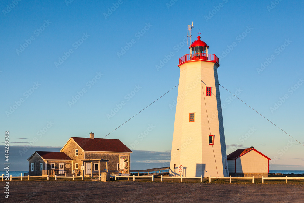 Canada, New Brunswick, Miscou Island. Miscou Lighthouse at sunset.