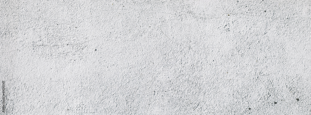 Fototapeta premium Plastered light gray wall surface background with scratches and cracks. High resolution grungy wall texture. Panoramic banner