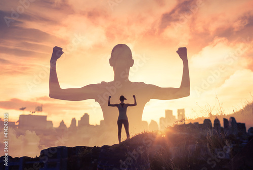 Mental, and physically strong woman in the city. Inner strength and feeling motivated concept. 