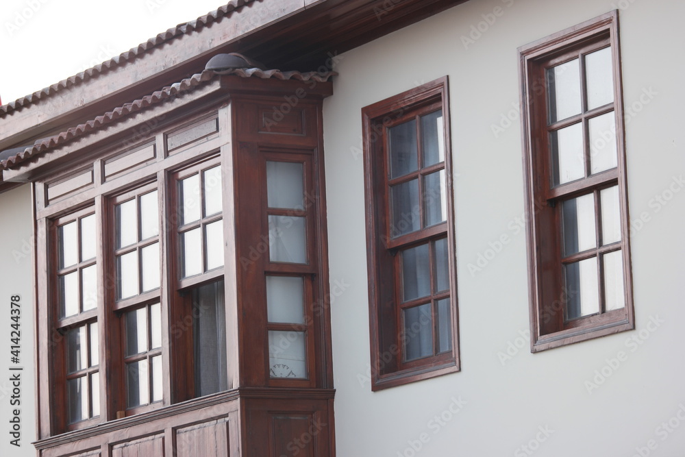 Facade of traditional house at turkish town. Windows of ottoman style house. Facade of traditional house at turkish town. Windows of ottoman style house.