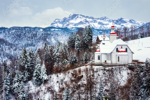 Hergiswald church in swiss Alps, Lucerne, Switzerland photo