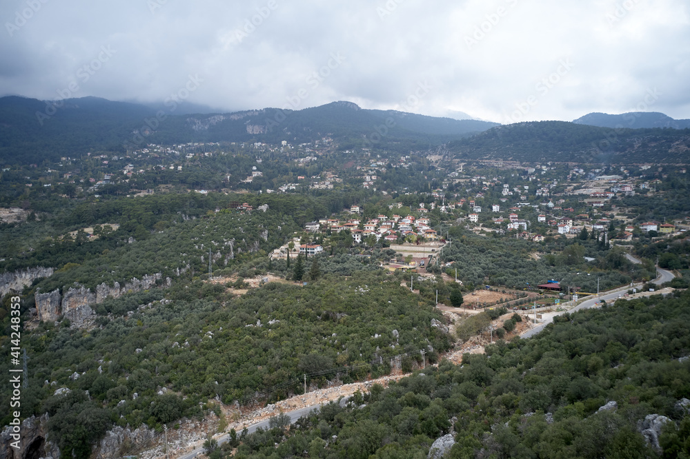 Picturesque landscape of mountain valley. Spectacular view of mountain valley village. Summer day in mountainous countryside.