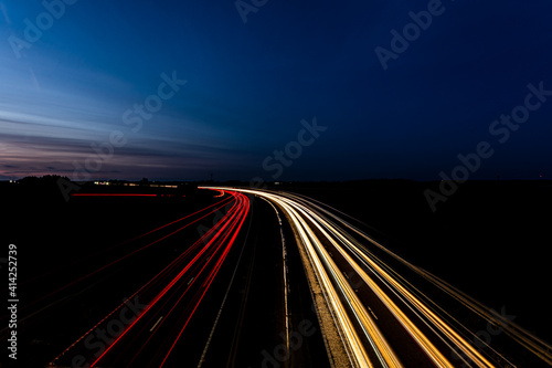Highway car light trails at night