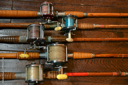 Vintage bamboo fishing rods and conventional reels