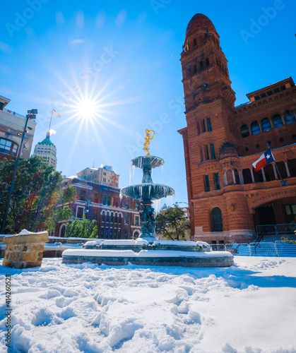 Snow Day at the Bexar County Courthouse in San Antonio Texas. Frozen fountain with icicles at the courthouse