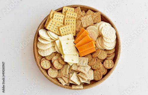 Charcuterie plate of cheese and crackers for party celebration and appetizer nibble tray at home 