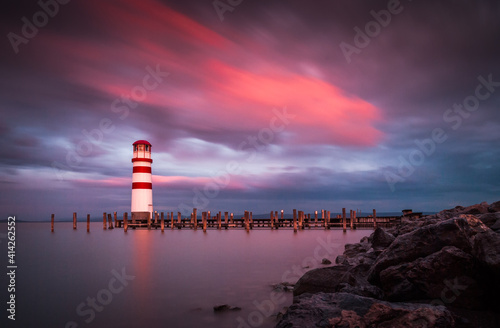 Obraz na płótnie Lighthouse at Lake Neusiedl, Austria at Beautiful Pink Sunset w salonie