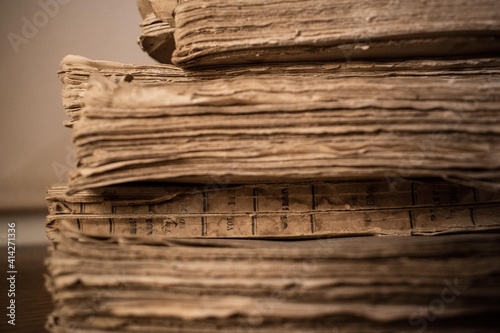 Antique pages. Lots of old books, texture of old paper. Papyrus background 