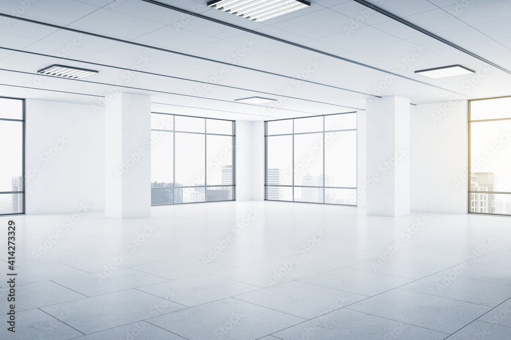 Modern spacious empty light hall room with big windows, ceramic tiles on the floor and lights on top Modern spacious empty light hall room with big windows, ceramic tiles on the floor and lights on top