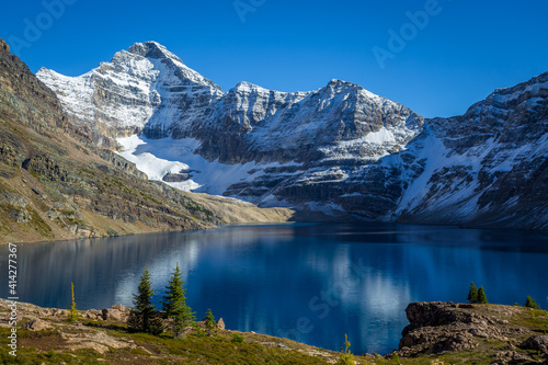 Canadian Rockies landscape of a blue lake surrounded by mountains with snow during autumn  Lake McArthur  Yoho National Park  British Columbia  Canada