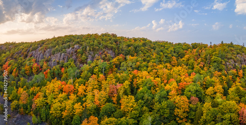 Autumn aerial views on the drive through the tunnel of Trees in Michigan Upper Peninsula UP - Highway 41 M26 Aerial view