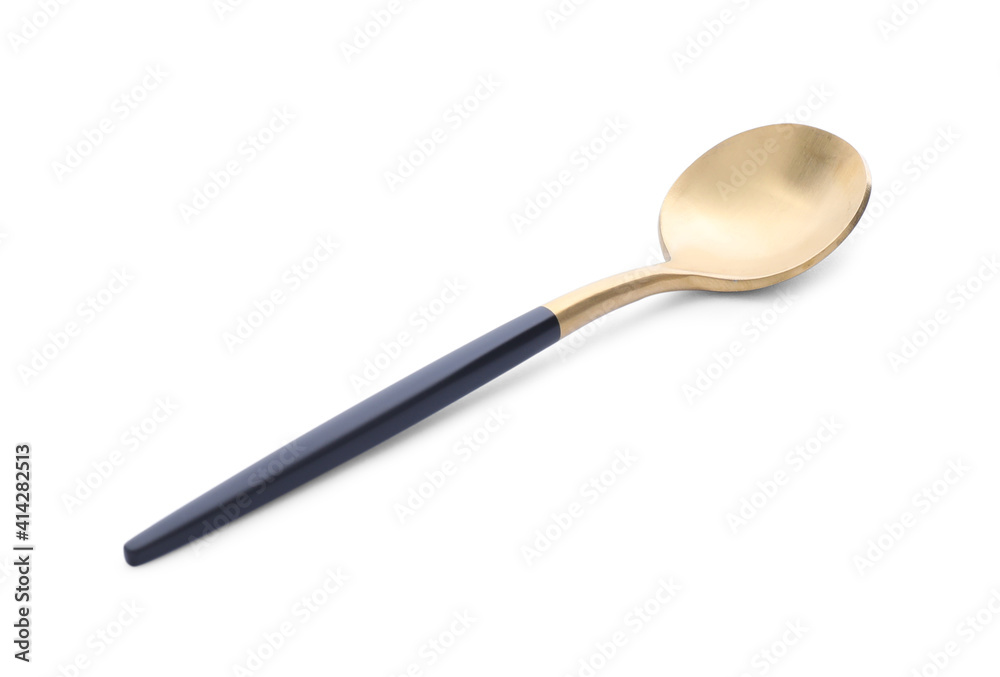 Shiny golden tea spoon isolated on white Shiny golden tea spoon isolated on white