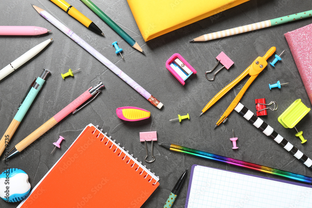 Flat lay composition with school stationeries on grey background Flat lay composition with school stationeries on grey background