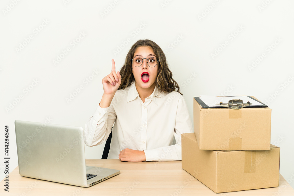 Young caucasian worker of a parcel company isolated having an idea, inspiration concept. Young caucasian worker of a parcel company isolated having an idea, inspiration concept.