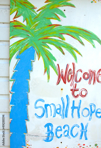 painted Beach hut Shanklin Isle of Wight Welcome toSmall Hope Cover  palm tree and writing photo