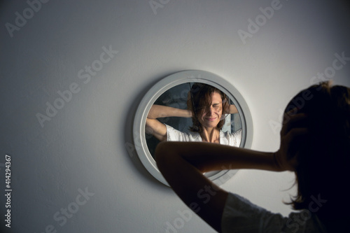 Photography Reflection of a woman's face in broken mirror