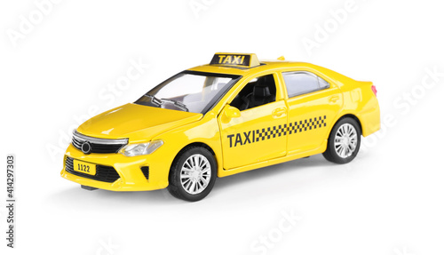 Yellow taxi car with roof sign on white background © New Africa