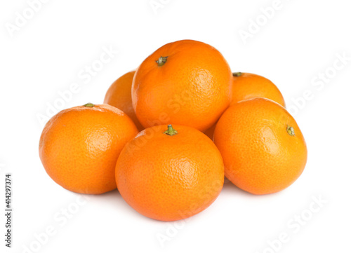 Pile of delicious ripe tangerines on white background