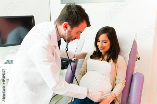 Expectant mother at a routine checkup with her doctor
