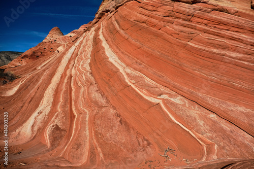 Textured sandstone under the blue sky. Utah and Arizona states of Southwest. United States of America