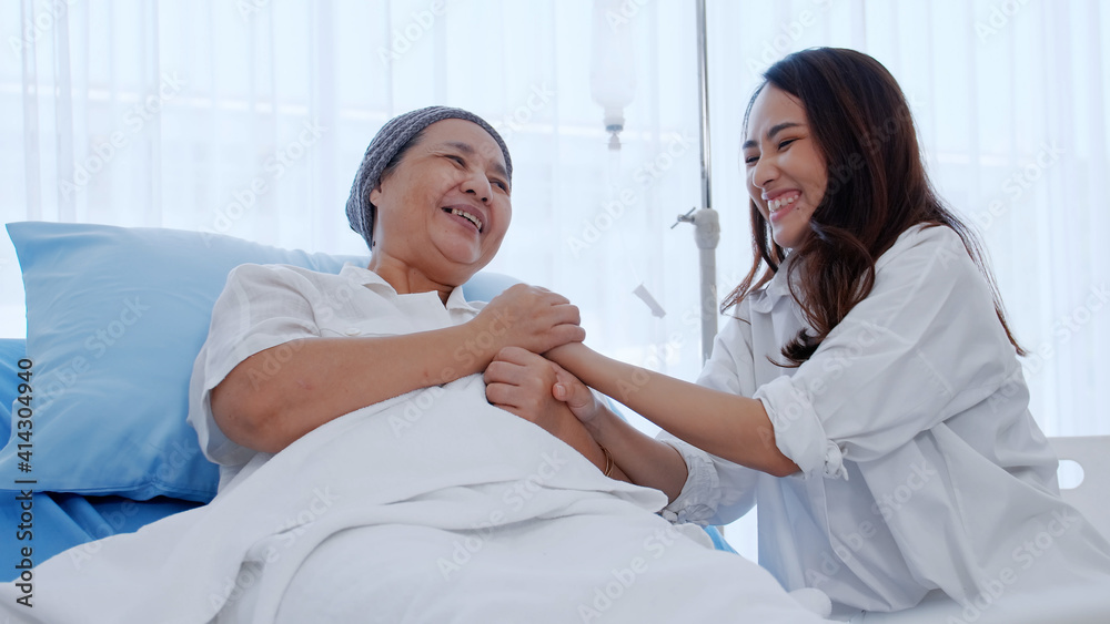 daughter encourages and comforts a mother with cancer during hospitalization. daughter encourages and comforts a mother with cancer during hospitalization.