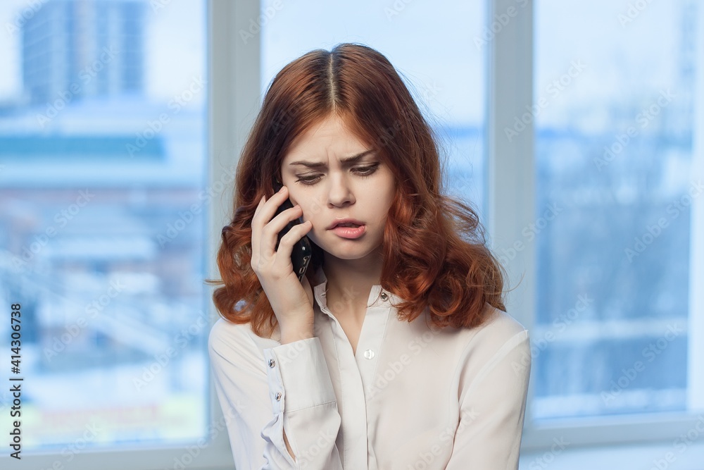 Business woman in white shirt with phone in hands communication Business woman in white shirt with phone in hands communication
