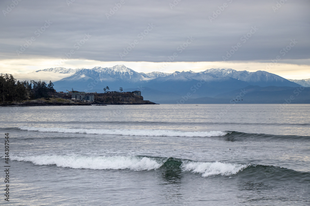 View from Whiffin Spit of mountains, sea at East Sooke Point in British Columbia, Canada