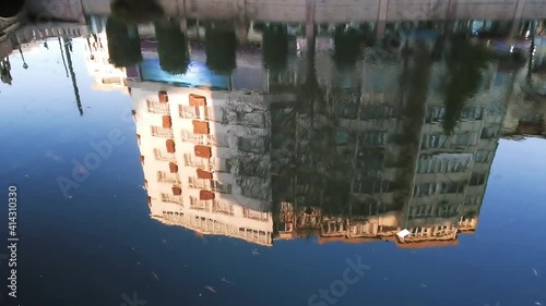 Slow motion reflection of the city on the canal. Eskisehir, Turkey.