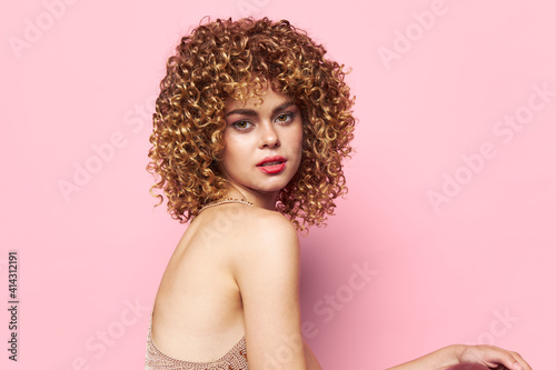 Charming model curly hair pink background pink background