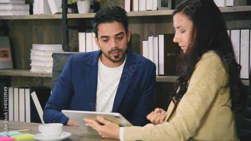 Business people meeting together in modern office discussing and brainstorming about company contract document