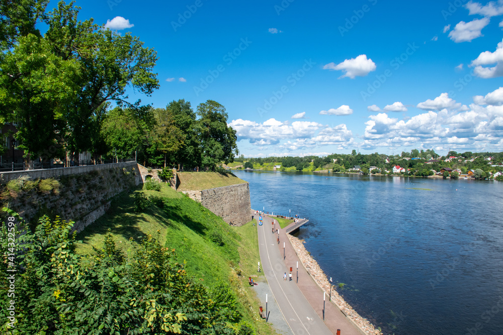 Old bastions and park along the Narva Promenade by the Narva River in eastern Estonia by the Russian border