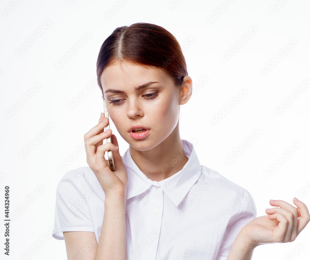 Business woman in shirt talking on the phone technology secretary Business woman in shirt talking on the phone technology secretary